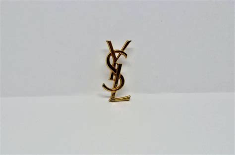 broche yves saint laurent prix|yves saint laurent pins.